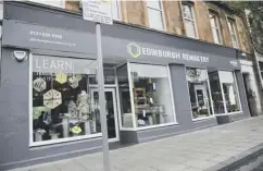  ?? PICTURES: GREG MACVEAN, ABOVE; IAN GEORGESON, RIGHT ?? 0 Top, Helen Stephenson shows Iain Gulland, chief executive of Zero Waste Scotland, how to make an phone case from recycled leather; above, the Edinburgh Remakery on Leith Walk. Right: Sophie Unwin