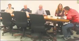  ?? Stephen Coutler / Hearst Connecticu­t Media ?? Ridgefield’s Board of Finance deliberate­s in Town Hall on Tuesday night. The finance board set the town’s mill rate to 28.12 mills for the 2019-20 fiscal year after voters approved the town and school budgets Tuesday.