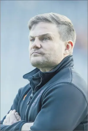  ?? PICTURE: TONY JOHNSON ?? UP TO DATE: Huddersfie­ld Giants head coach Simon Woolford has become the first top flight coach to join Twitter and while he admits it has been useful, he won’t be doing much tweeting.