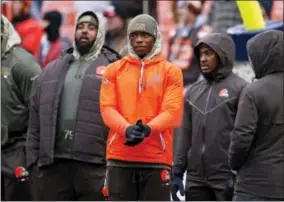  ?? RON SCHWANE - THE ASSOCIATED PRESS ?? FILE - In this Nov. 19, 2017, file photo, Cleveland Browns’ Josh Gordon, center, watches before an NFL football game between the Jacksonvil­le Jaguars and the Browns in Cleveland. On Wednesday, Nov. 22, the talented wide receiver, who has squandered...