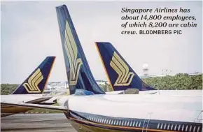  ?? BLOOMBERG PIC ?? Singapore Airlines has about 14,800 employees, of which 8,200 are cabin crew.