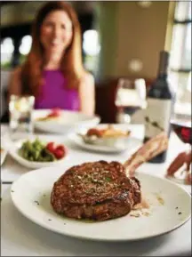  ?? BLOOMIN’ BRANDS INC. ?? The 35-ounce Tomahawk steak is designed to entice those looking to treat Dad for Father’s Day to consider a visit to a Fleming’s Prime Steakhouse & Wine Bar, such as the location in Woodmere.