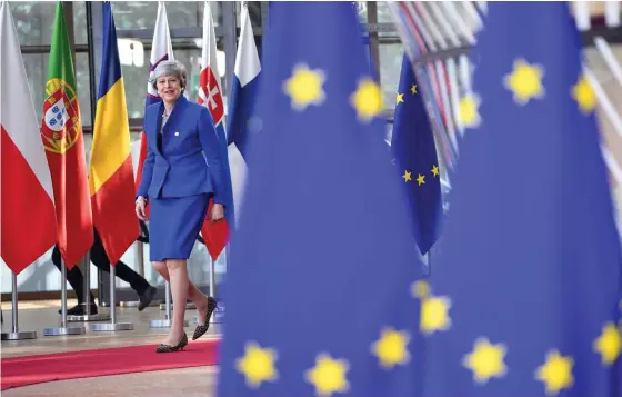  ?? FOTO: LEHTIKUVA-AFP/PHILIPPE HUGUEN ?? Theresa May – än en gång på väg in till ett EU-möte om brexit i går kväll.