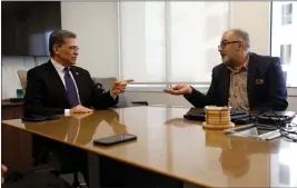  ?? PHOTOS BY NHAT V. MEYER — BAY AREA NEWS GROUP ?? United States Secretary of Health and Human Services Xavier Becerra, left, speaks with Frank Pine, executive editor of the Bay Area News Group and MediaNews Group at The Mercury News in downtown San Jose on Monday.