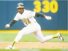  ?? Otto Greule Jr. / Getty Images 1991 ?? Tim Raines (30) hit .294 in a 23-year career that began in 1979. Rickey Henderson hit .279 in a 25-year career that began in ’79.