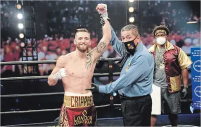  ?? SEAN MICHAEL HAM/TGB PROMOTIONS ?? Douro boxer Cody Crowley is declared the winner over Josh Torres of New Mexico in Los Angeles on Sept. 6. Crowley’s trainer, Ibn Cason, is at right.