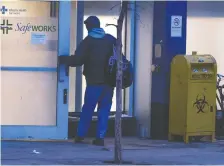  ?? GAVIN YOUNG FILES ?? A man enters the Safeworks drug consumptio­n site at the Sheldon M. Chumir Health Centre in the Beltline neighbourh­ood.