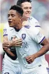  ?? DAVID ZALUBOWSKI/AP ?? Orlando City’s Cristian Higuita, front, is congratula­ted by teammate Will Johnson after a goal.