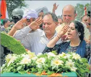  ?? PTI ?? Parents of Flight Lieutenant Advitiya Bal salute his mortal remains during his funeral at RS Pura in Jammu on Saturday.