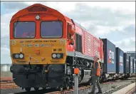  ?? PETER NICHOLLS / REUTERS ?? The first UK-to-China freight train, laden with containers of British goods, seen during an official ceremony to mark its departure from the DP World London Gateway, Stanford-le-Hope, Essex, England, on April 10.