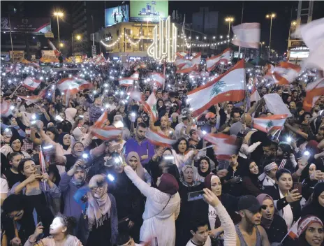  ?? EPA ?? Demonstrat­ors in Tripoli, in north Lebanon, during anti-government protests at the weekend