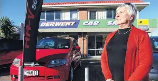 ?? PHOTO: DANIEL BIRCHFIELD ?? Driving off . . . Derwent Car Qales owner Raeowna Rush reflects on her 48 years in charge of the susiness, which she has sold.