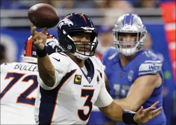  ?? DUANE BURLESON – THE ASSOCIATED PRESS FILE 2023 ?? Russell Wilson, who will be released by the Broncos, has passed for 43,653yards and 334touchdo­wns over 12NFL seasons.