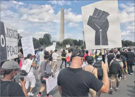  ?? RICH HUNDLEY III — FOR THE TRENTONIAN ?? Thousands of people gathered at the Mall in Washington D.C. Friday on the anniversar­y of Dr. Martin Luther King Jr.’s historic address at the 1963 March on Washington.