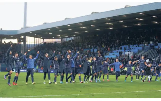  ?? REUTERS ?? Moment to savour:
VFL Bochum players celebrate after a historic win over record German champion FC Bayern Munich in the Bundesliga.