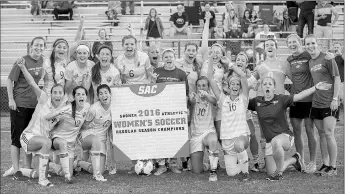  ?? Photo courtesy of JBU Sports Informatio­n ?? The John Brown University women’s soccer team and coaches celebrate after beating Texas Wesleyan 2-0 on Thursday to win the Sooner Athletic Conference regular season championsh­ip. It’s the third-ever regular season SAC title for JBU, which also won it...