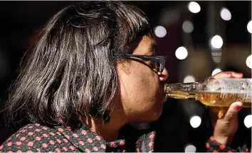  ??  ?? I’ll drink to that: Diane Abbott enjoying a beer at a party last year