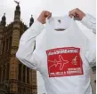  ??  ?? A demonstrat­or in support of Bombardier workers at the UK’s Houses of Parliament