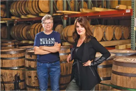  ?? JESSICA ATTIE/THE NEW YORK TIMES ?? Marlene Holmes and Heather Greene, two of the founders of Milam & Greene distillery in Blanco, Texas, are part of a surge in the number of women making whiskey.