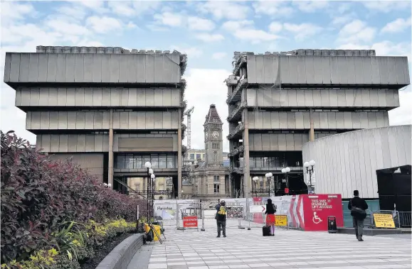  ??  ?? > Birmingham Central Library during its demolition earlier this year – its loss sparked a series of calls to save the rest of the Second City’s post war buildings