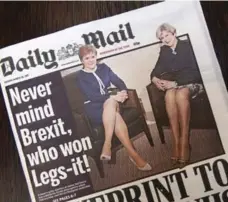  ?? JUSTIN TALLIS/AFP/GETTY IMAGES ?? Britain’s Daily Mail faced backlash Tuesday for a front page focusing on the legs of British PM Theresa May and Scottish First Minister Nicola Sturgeon.