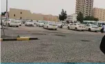  ??  ?? KUWAIT: Taxi cars lined up at open yards in Kuwait yesterday.