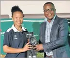  ??  ?? JUBILANT: Ghandi Jafta receives an award from Mercedes Benz’s Asanda Fonqo. Jafta has national colours for being in the SA U19 team