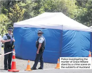 ??  ?? Police investigat­ing the murder of Grace Millane stand by a crime scene on the outskirts of Auckland