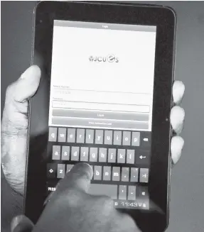  ??  ?? The JCUES epayment service app, later rebranded as Conec mobile wallet, is displayed in this 2014 file photo. The Jamaican government is gearing to distribute social welfare benefits through mobile money platforms.