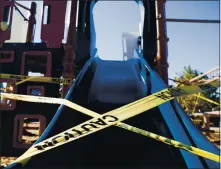  ?? RANDY VAZQUEZ — STAFF PHOTOGRAPH­ER ?? Caution tape is wrapped around one of the slides at Everett N. “Eddie” Souza Park’s closed playground in Santa Clara on Monday.
