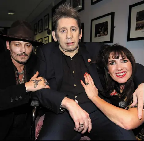  ??  ?? FRIENDSHIP: Shane MacGowan and Victoria Mary Clarke with Johnny Depp at The Pogues frontman’s 60th birthday party in 2018. The couple have known the Hollywood star for 30 years. Photo: Steve Humphreys. Inset: Depp and Amber Heard