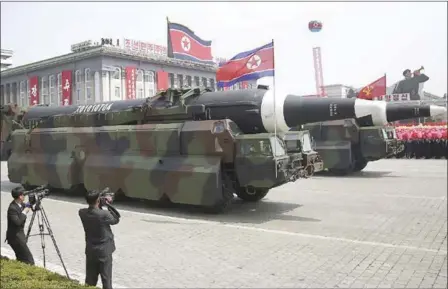  ?? WONG MAYE-E — THE ASSOCIATED PRESS ?? Military experts say what appears to be a North Korean KN-08Intercon­tinental Ballistic Missile is paraded across Kim Il Sung Square during a military parade on Saturday, in Pyongyang, North Korea. It was part of a celebratio­n of the 105th birth...