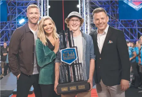  ??  ?? TOP NINJA: Charlie Robbins ( centre) with Australian Ninja Warrior announcers Andrew Flintoff, Rebecca Maddern and Ben Fordham.