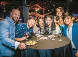  ?? ?? Guests taste wines from sought-after regions and hang with like-minded friends at the Orlando Science Center’s Science of Wine event.