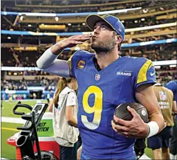  ?? ASHLEY LANDIS / AP ?? Rams quarterbac­k Matthew Stafford walks off the field after a win over the New Orleans Saints on Dec. 21 in Inglewood.