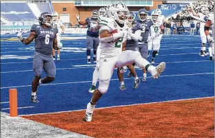  ?? DARIN OSWALD / IDAHO STATESMAN ?? Ohio’s Julian Ross scores against Nevada in the Famous Idaho Potato Bowl on Jan. 3 in front of an announced crowd of 13,611, a record low for the bowl.