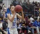  ?? JOHN BLAINE — FOR THE TRENTONIAN ?? Trenton Catholic’s Giana HernandezB­oulden (10) shoots a 3-pointer during the Non-Public B South final against Gloucester Catholic at Jackson Liberty on Wednesday night.