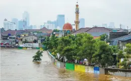  ?? Picture: AFP ?? VULNERABLE. Flooded residentia­l houses after heavy rain in Jakarta, Indonesia. Of the 100 cities worldwide most vulnerable to environmen­tal hazards all but one are in Asia, says a report.