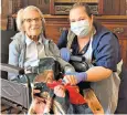  ??  ?? Connie Titchen, 106, thought to be the UK’S oldest virus survivor, with Sister Kelly Smith