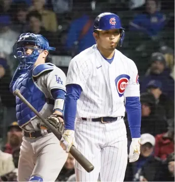  ?? GETTY IMAGES ?? The Cubs’ Seiya Suzuki walks back to the dugout after striking out in the fifth inning of Game 2.