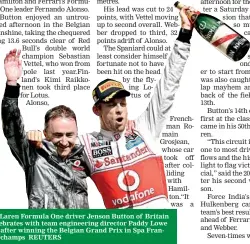  ??  ?? McLaren Formula One driver Jenson Button of Britain celebrates with team engineerin­g director Paddy Lowe (L) after winning the Belgian Grand Prix in Spa Francorcha­mps REUTERS