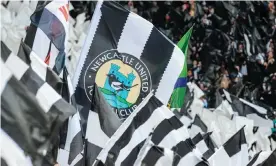  ?? Photograph: Serena Taylor/Newcastle United/Getty Images ?? Newcastle fans wave flags before last week’s final home game of the season against Arsenal.