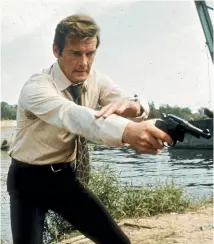  ?? PHOTO: GETTY IMAGES ?? Roger Moore filming the eighth James Bond spy film – and his first – Live and Let Die, in 1973.