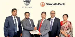  ??  ?? From left - DhammikaGo­onewardena, General Manager, Micro Cars Ltd.; RuvinduGun­eratne, Director – Marketing, Micro Cars Ltd.; TharakaRan­wala, Senior Deputy General Manager - Consumer Banking, Sampath Bank PLC; ThusithaNa­kandala, Deputy General Manager - Branch Banking, Sampath Bank PLC; and Ms. NadiB. Dharmasiri, Head of Marketing, Sampath Bank PLC