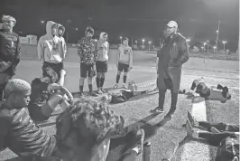  ?? JOHN GUTIERREZ/SPECIAL TO AMERICAN-STATESMAN ?? Connally boys soccer coach Ryan Ford talks to his team during halftime of their district game against Georgetown on Feb. 16. The Cougars shut out Crockett 6-0 on Monday night in a Class 5A bi-district playoff to advance to the area round this weekend.