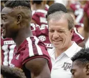  ?? Melissa Phillip / Staff photograph­er ?? Jimbo Fisher likes what he sees of his first A&amp;M team, which eases into its season Thursday against a Northweste­rn State that is a heavy underdog.