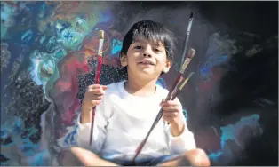  ?? SHRUTI KOLARKAR VIA CP ?? Advait Kolarkar, 4, is seen in this undated handout photo. The preschoole­r is making a name for himself as an abstract painter.