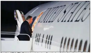  ??  ?? Secretary of State Mike Pompeo boards his plane Thursday for a flight to Kyiv, Ukraine, after a visit in London, the first stop on a trip that will also take him to Belarus, Kazakhstan and Uzbekistan. (AP/Kevin Lamarque)