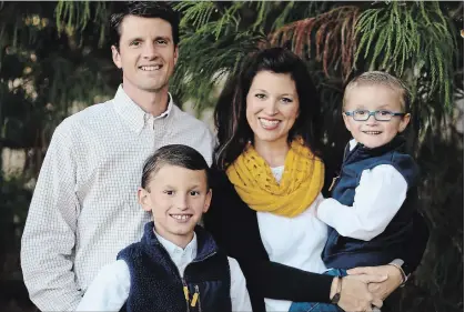  ?? PHOTO BY REBECCA HELTON ?? Josh and Laura Ledbetter with their sons Cooper, 9, and Grayson, 5. Grayson has a rare neurologic­al disorder called Alexander disease.