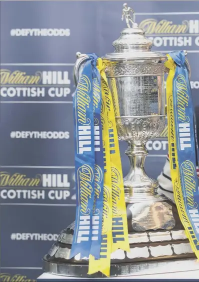  ??  ?? Kevin Thomson poses yesterday with the William hill scottish Cup. hibs’ latest attempt to bring it back